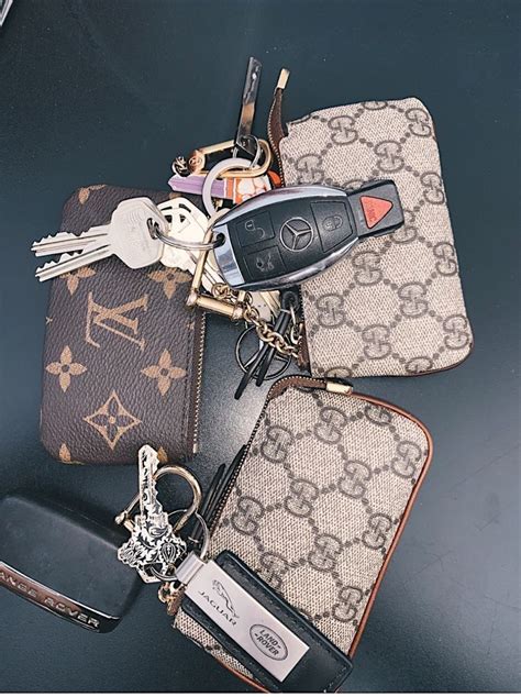 louis vuitton lock and key fake|louis vuitton keychain pouch.